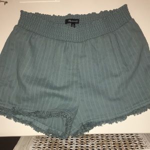 Madewell teal pull on shorts.